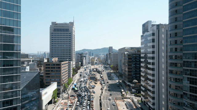 Congested city roads with tall buildings