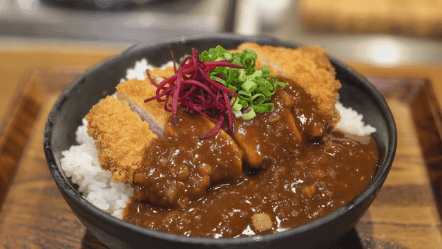 Curry rice topped with crispy pork cutlet