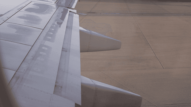 Airplane wing on the runway
