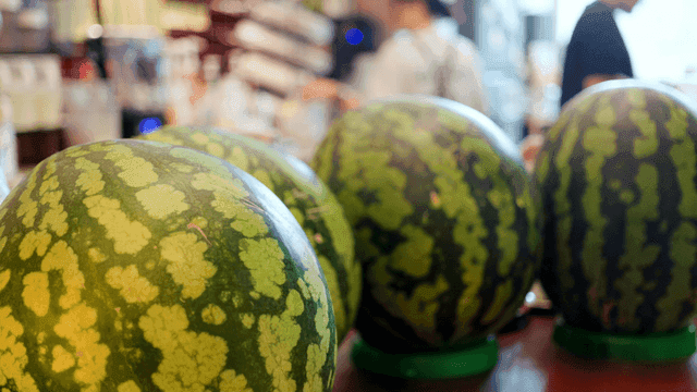 Watermelon displayed on cafe counter