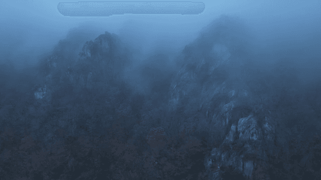 Serene mountains shrouded in fog