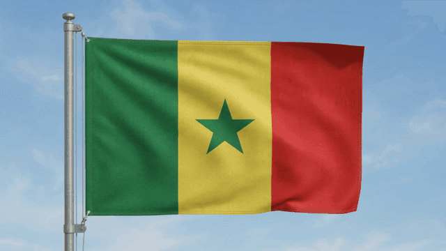 Senegalese flag fluttering under clear sky