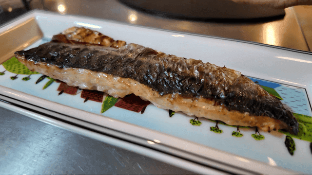 Grilled mackerel on plate
