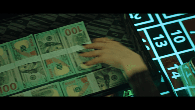 Pile of dollar cash on roulette table