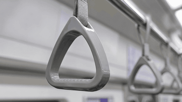 Subway handrail in a train car