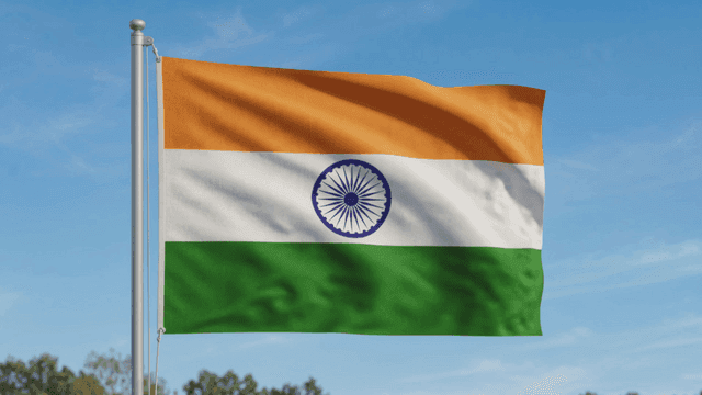 Indian flag waving against a clear sky