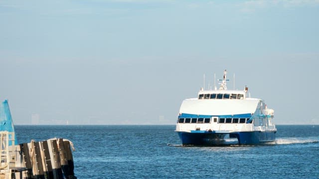 Cruise Ship Sailing on Calm Sea on a Clear Day