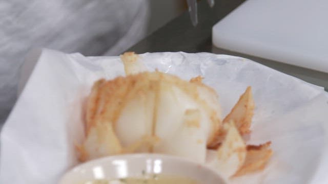 Cutting Crispy Fried Onions with Scissors