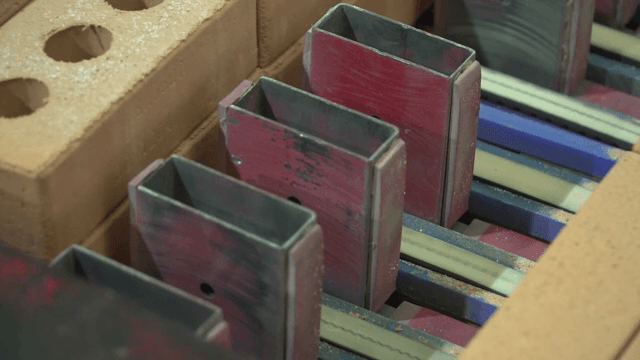 Bricks being processed on a conveyor belt