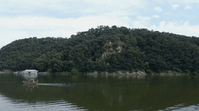 Tranquil river with traditional boats