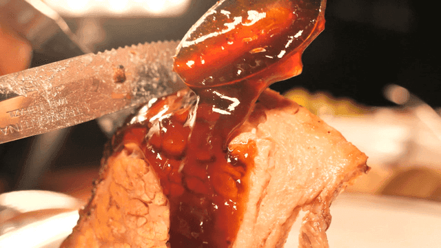 Meat poured with barbecue sauce