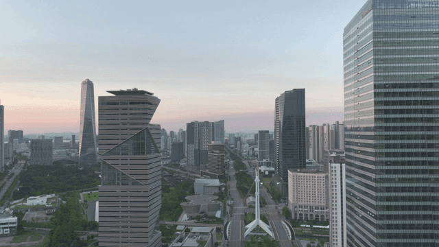 Modern city skyline at sunset