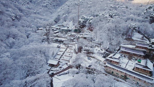 Snow-covered traditional Korean temple