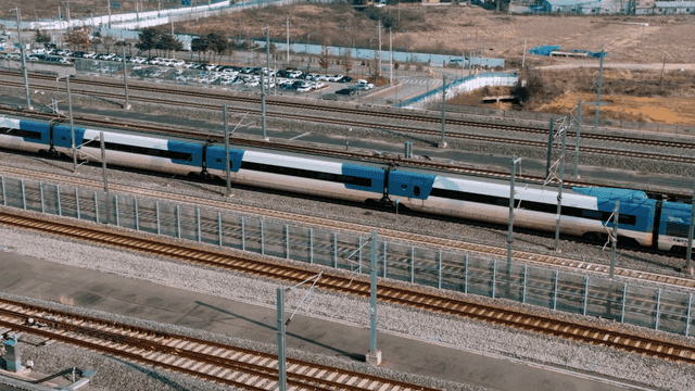High-speed train speeding past on railway