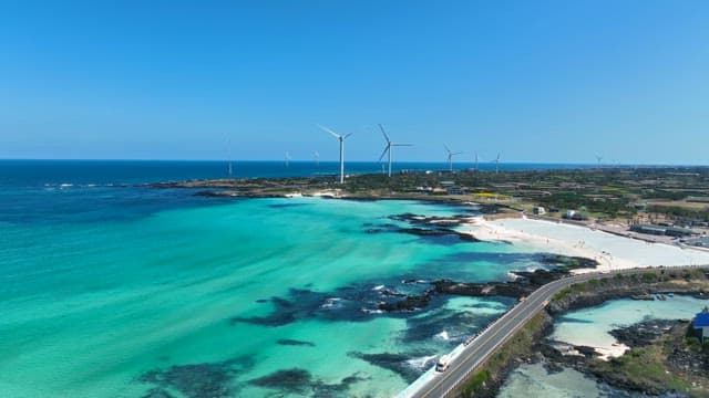 Coastal landscape with wind turbines