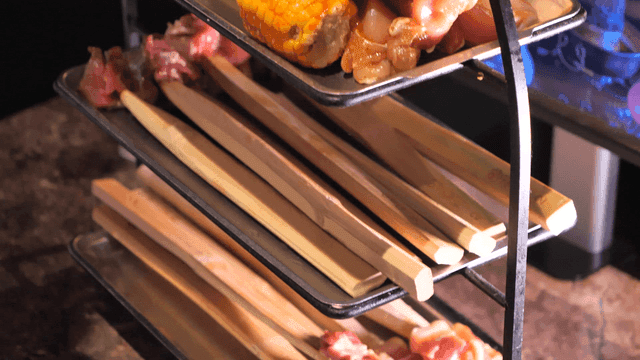 Various skewers with meat and vegetables
