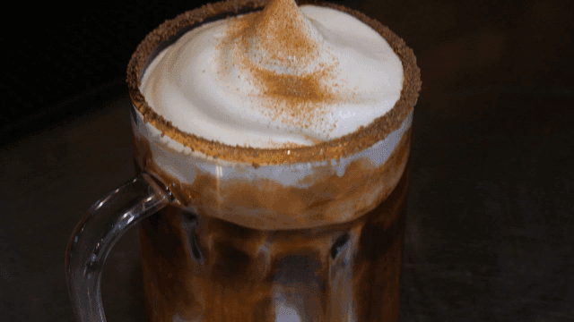 Coffee with cream and cinnamon