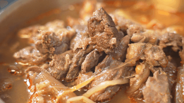 Korean beef soup filled with meat in bowl