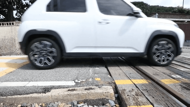 Vehicle crossing railroad tracks