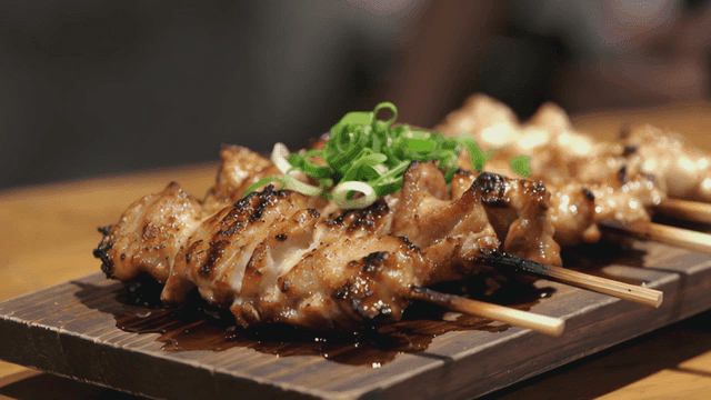 Izakaya chicken skewers grilled with green onions