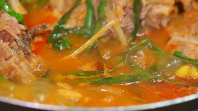 Meat soaked in pork backbone stew soup