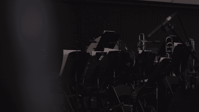 Empty orchestra stage with instruments