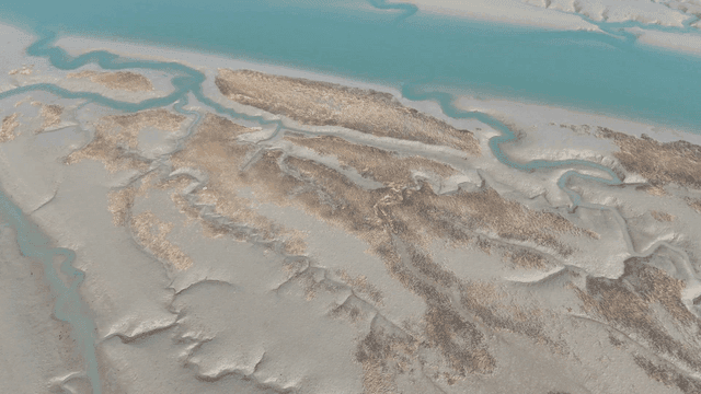 Aerial view of a winding river and sandbanks