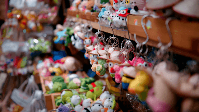 Display of keychains and dolls in various colors