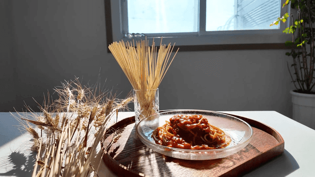 Tomato sauce spaghetti on table