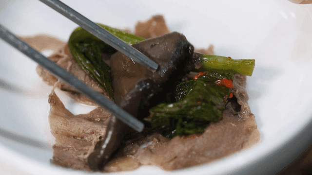 Korean beef with greens and mushrooms