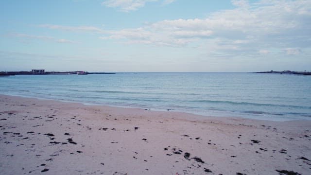 Calm ocean under a clear blue sky