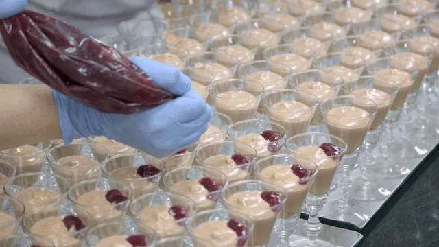 Dessert preparation with berry topping