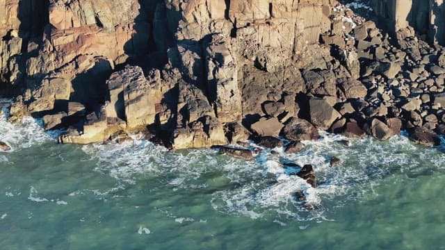 Serene Coastal Cliffs with Gentle Waves