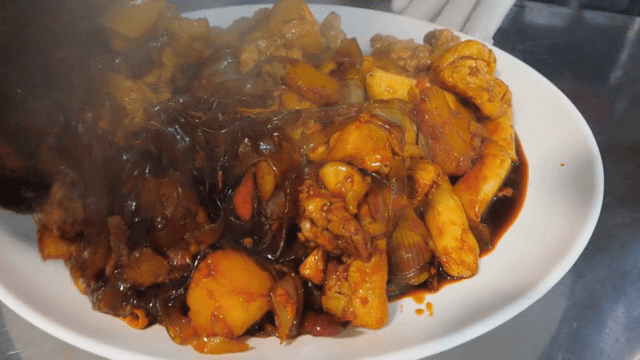 Plate of Braised chicken with various ingredients