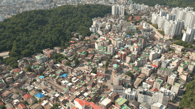 Aerial view of a city with dense buildings