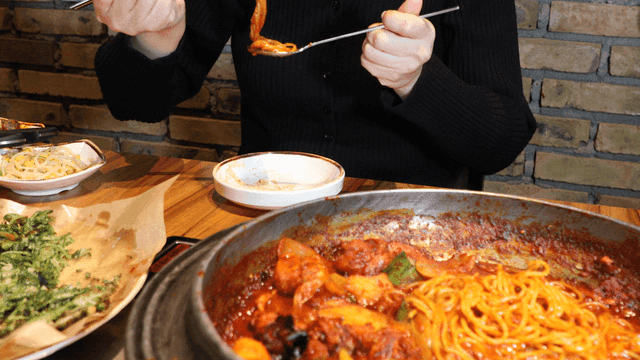 Eating spicy jjagalbi and noodles