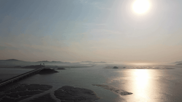 Serene coastal scenery with bridge