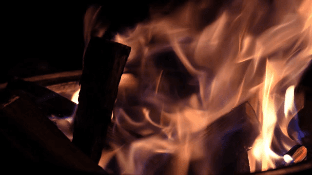 A campfire burning with bright flames