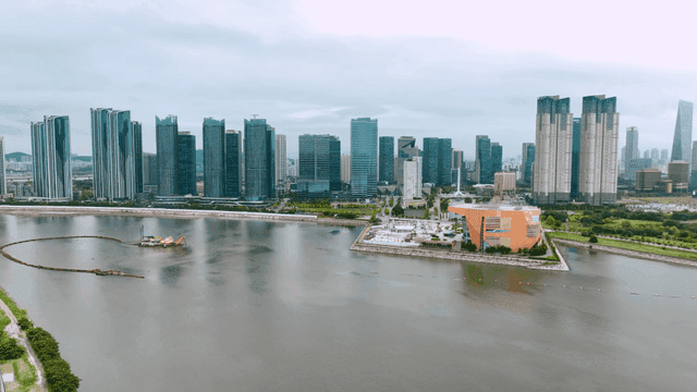 Modern city skyline with river view