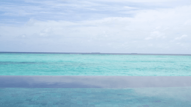 Calm ocean with clear blue water