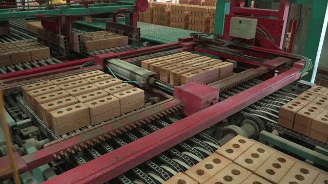 Bricks on a conveyor in a factory