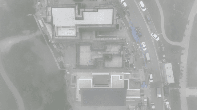 Foggy construction site with buildings