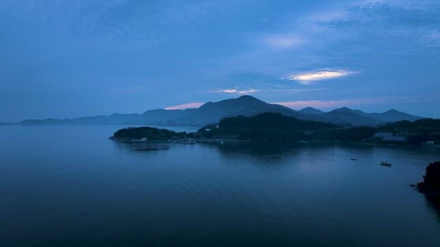 Serene Dawn over Coastal Landscape