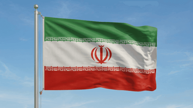 Iranian flag fluttering under clear sky