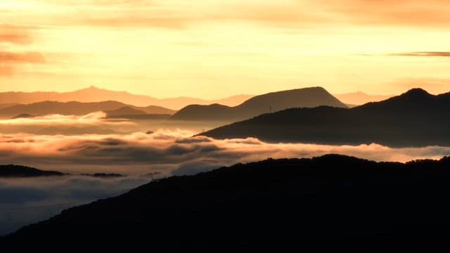 Mountains and clouds at sunrise