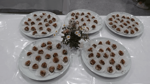 Plates of Korean sweet rice with nuts and jujubes with flowers
