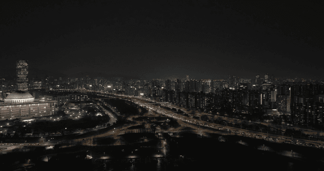 Night view of a bustling city with skyscrapers