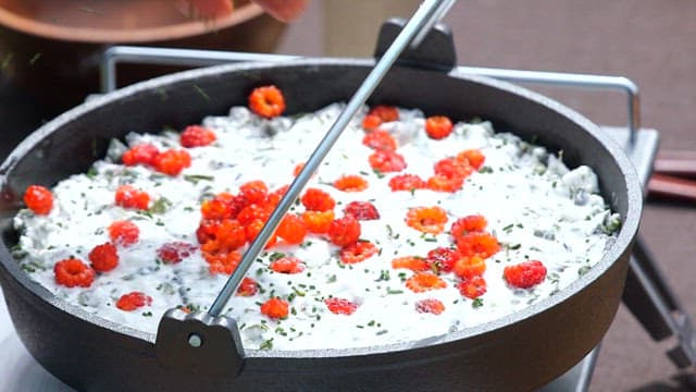 Delicious Berry and Cream Dish Being Prepared