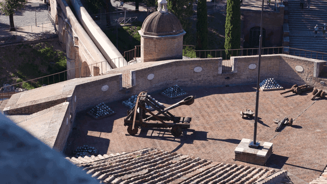 Historic fortress with ancient catapult