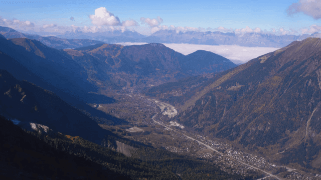 Vast mountain valley with river flowing through it